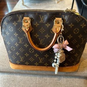 Louis Vuitton Iconic Alma Bag! Pic of Serial Number for Authentication